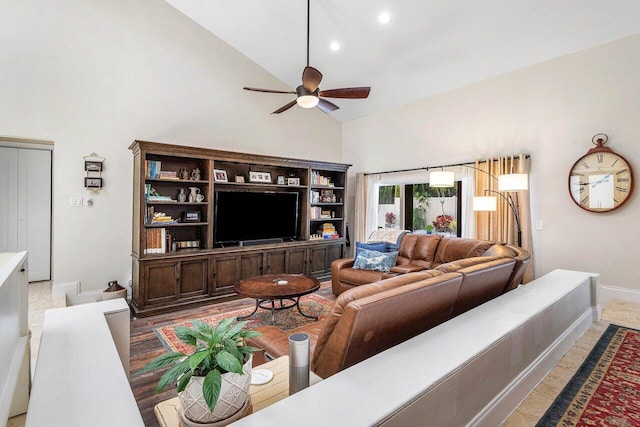 2626 NW 42nd St, Boca Raton, FL 33434 - living area with high vaulted ceiling, baseboards, a ceiling fan, and recessed lighting