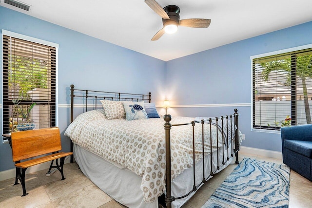 2626 NW 42nd St, Boca Raton, FL 33434 - bedroom featuring baseboards, a ceiling fan, and tile patterned flooring