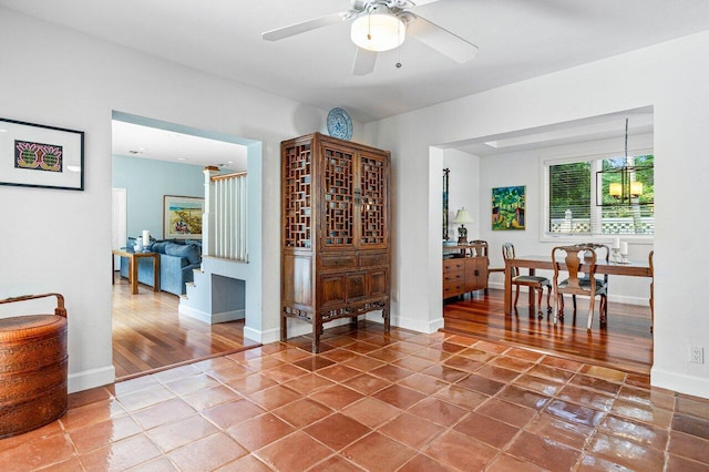 310 NW 18th St, Delray Beach, FL 33444 - entrance foyer with tile patterned flooring, a ceiling fan, and baseboards