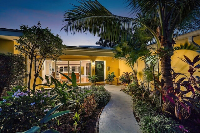 310 NW 18th St, Delray Beach, FL 33444 - property entrance with stucco siding
