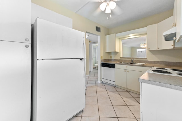 2860 SW 22nd Ave Unit 4170, Delray Beach, FL 33445 - kitchen with white appliances, range hood, light tile patterned flooring, ceiling fan, and white cabinets