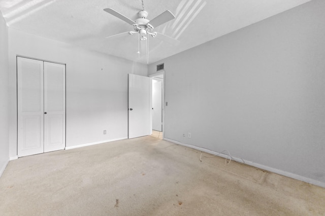 2860 SW 22nd Ave Unit 4170, Delray Beach, FL 33445 - unfurnished bedroom with carpet, a closet, and a ceiling fan