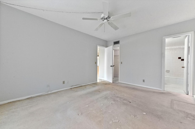 2860 SW 22nd Ave Unit 4170, Delray Beach, FL 33445 - unfurnished bedroom featuring ensuite bath, carpet, and a ceiling fan