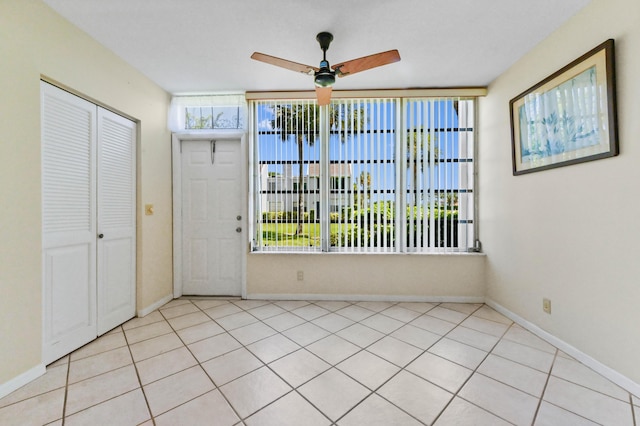 2860 SW 22nd Ave Unit 4170, Delray Beach, FL 33445 - foyer entrance with healthy amount of natural light, a ceiling fan, and light tile patterned flooring