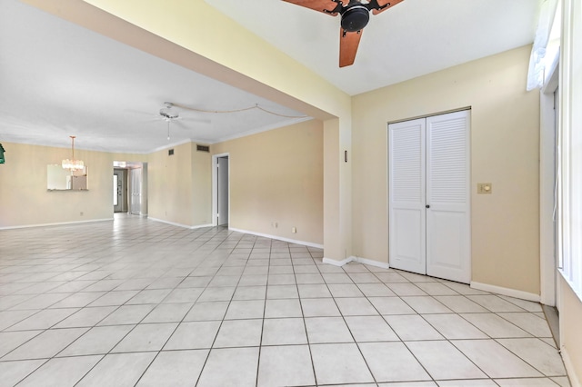 2860 SW 22nd Ave Unit 4170, Delray Beach, FL 33445 - unfurnished living room featuring ceiling fan, a chandelier, and ornamental molding