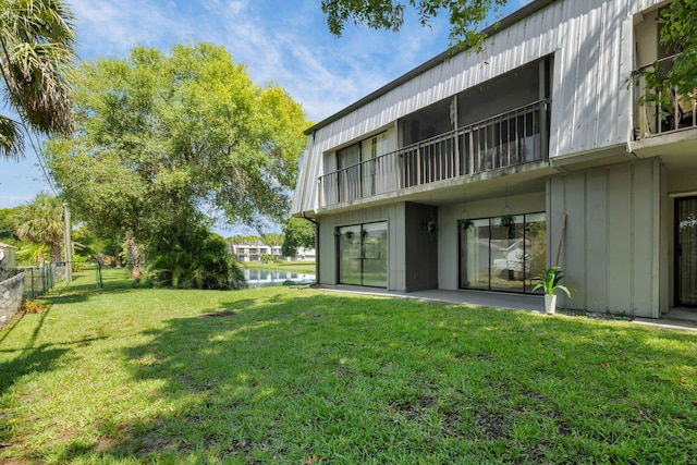 2517 S 17th St Unit 102, Fort Pierce, FL 34982 - view of yard with a water view and a balcony