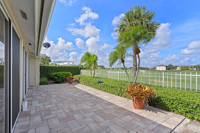 1415 Bear Island Dr, West Palm Beach, FL 33409 - fenced backyard with a patio area