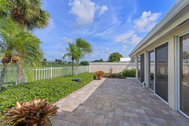 1415 Bear Island Dr, West Palm Beach, FL 33409 - fenced backyard featuring a patio