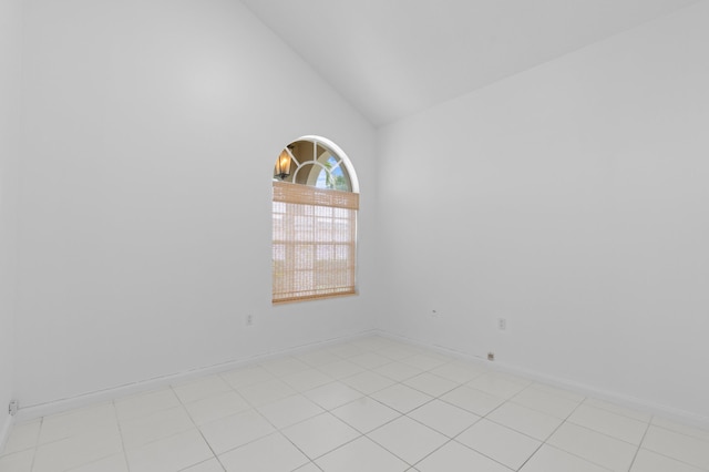 1415 Bear Island Dr, West Palm Beach, FL 33409 - spare room featuring high vaulted ceiling and baseboards