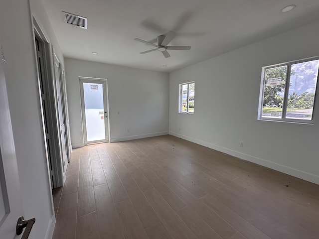 4641 Northview Dr, Jupiter, FL 33458 - spare room with a ceiling fan, wood finished floors, and recessed lighting