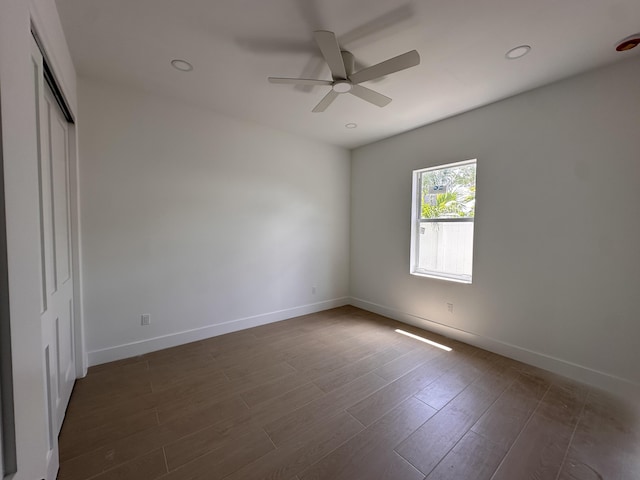 4641 Northview Dr, Jupiter, FL 33458 - unfurnished bedroom with dark wood-type flooring, a closet, recessed lighting, and ceiling fan