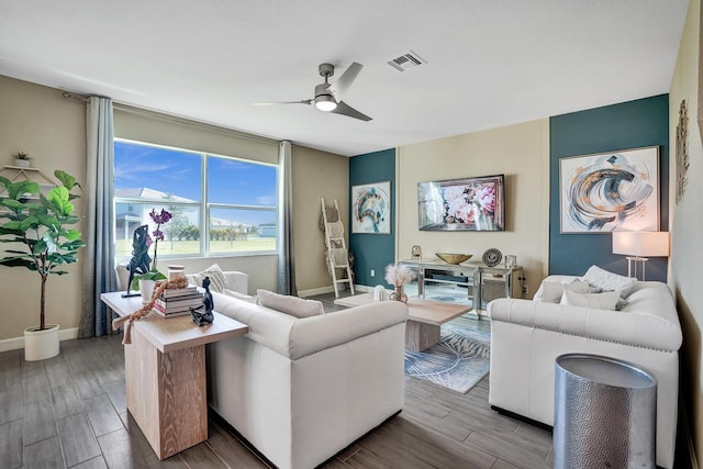 12623 NW Copper Creek Dr, Port Saint Lucie, FL 34987 - living room with wood finished floors, ceiling fan, and baseboards