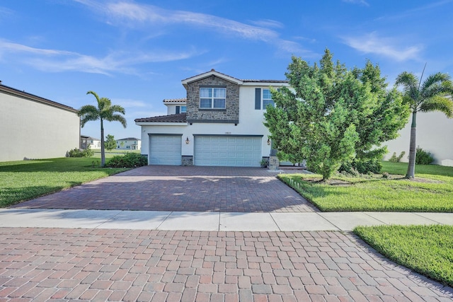 12623 NW Copper Creek Dr, Port Saint Lucie, FL 34987 - view of front of property featuring stone siding, stucco siding, a tiled roof, decorative driveway, and a garage
