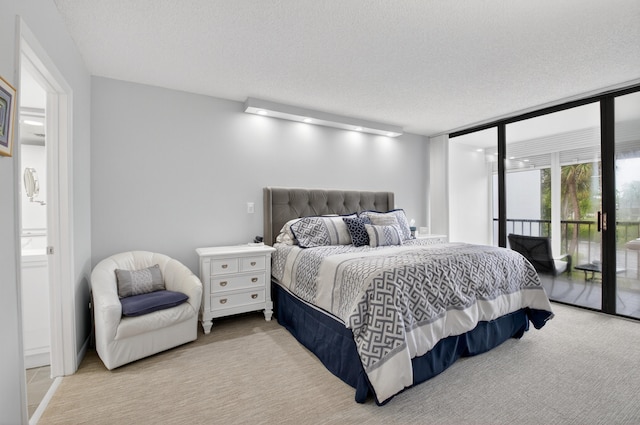 6815 Willow Wood Dr Unit 4022, Boca Raton, FL 33434 - carpeted bedroom featuring access to exterior and a textured ceiling