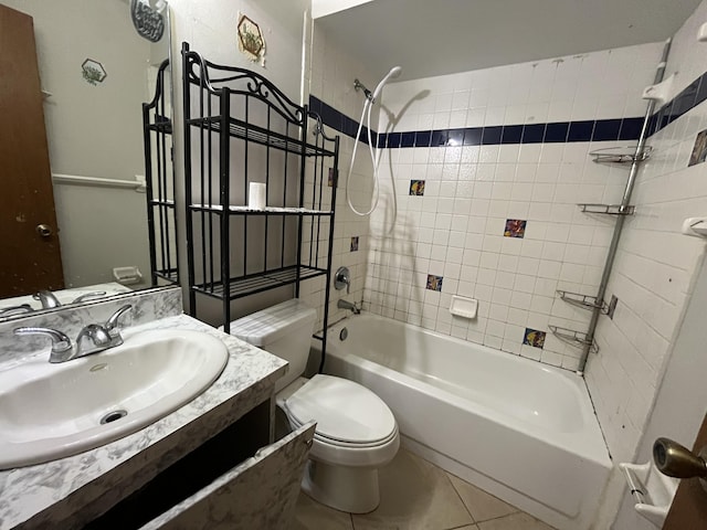 2955 SW Varsity Ln, Port Saint Lucie, FL 34953 - bathroom with toilet, washtub / shower combination, tile patterned flooring, and vanity