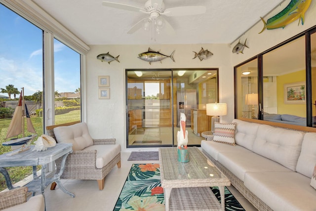 3209 S Lakeview Cir Unit 8-101, Hutchinson Island, FL 34949 - sunroom / solarium with outdoor lounge area, tile patterned floors, a ceiling fan, and healthy amount of natural light