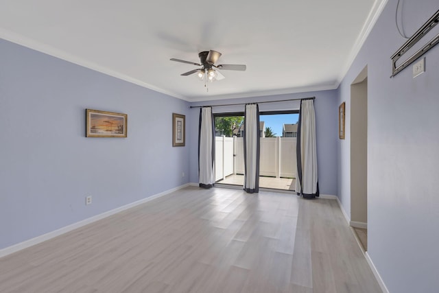 3209 S Lakeview Cir Unit 8-101, Hutchinson Island, FL 34949 - unfurnished room with ceiling fan, ornamental molding, and light wood-type flooring
