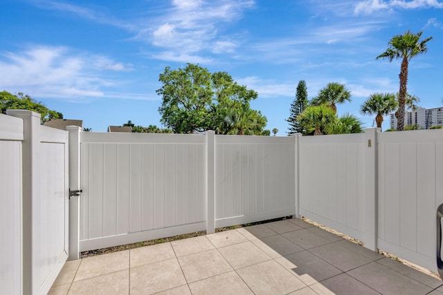 3209 S Lakeview Cir Unit 8-101, Hutchinson Island, FL 34949 - view of patio with a gate