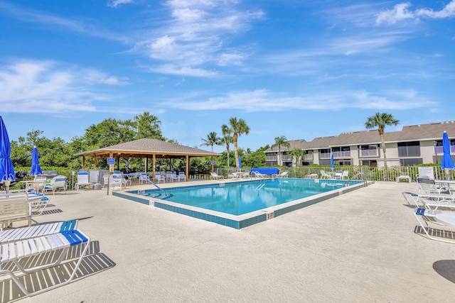 3209 S Lakeview Cir Unit 8-101, Hutchinson Island, FL 34949 - community pool with a gazebo and a patio