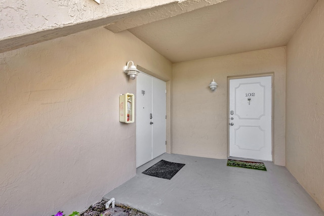 3209 S Lakeview Cir Unit 8-101, Hutchinson Island, FL 34949 - entrance to property featuring stucco siding