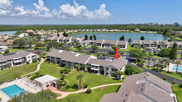 3209 S Lakeview Cir Unit 8-101, Hutchinson Island, FL 34949 - aerial perspective of suburban area featuring a large body of water and a pool