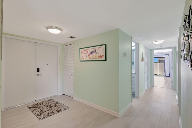 3209 S Lakeview Cir Unit 8-101, Hutchinson Island, FL 34949 - foyer with light wood-style floors