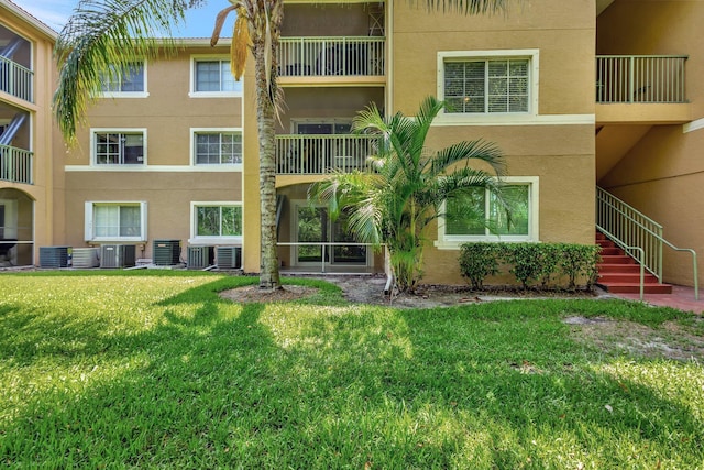 3693 NW Adriatic Ln, Jensen Beach, FL 34957 - view of building exterior with central AC