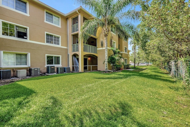 3693 NW Adriatic Ln, Jensen Beach, FL 34957 - view of building exterior featuring central AC unit