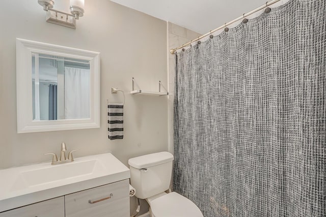 4641 Wadita Ka Way, West Palm Beach, FL 33417 - bathroom featuring toilet, vanity, and curtained shower