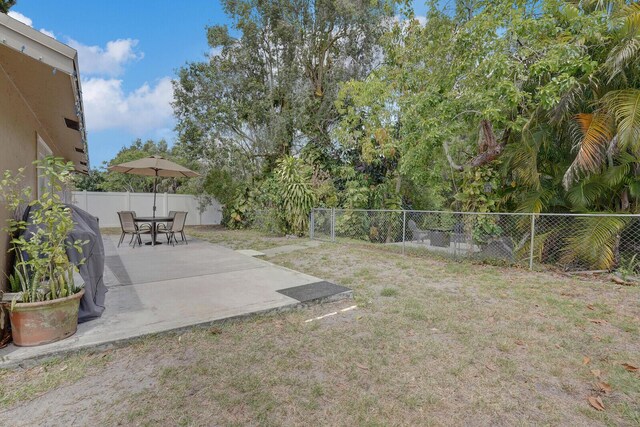 4641 Wadita Ka Way, West Palm Beach, FL 33417 - view of yard with a patio area