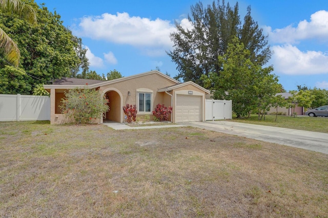 4641 Wadita Ka Way, West Palm Beach, FL 33417 - ranch-style home with driveway, stucco siding, and a garage