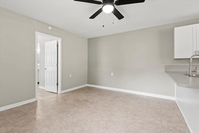 208 Olson Ave, Fort Pierce, FL 34946 - unfurnished room with a sink, ceiling fan, and baseboards