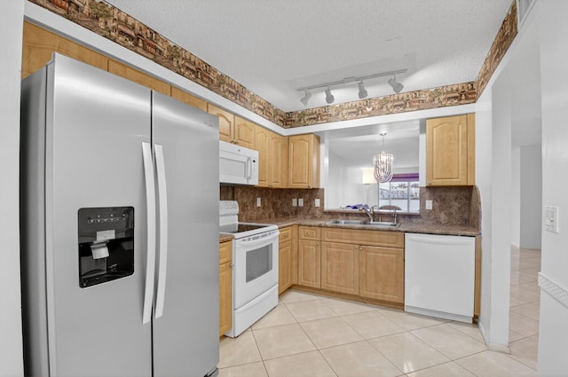6112 Huntwick Ter Unit 106, Delray Beach, FL 33484 - kitchen with white appliances, dark countertops, light tile patterned flooring, tasteful backsplash, and light brown cabinetry