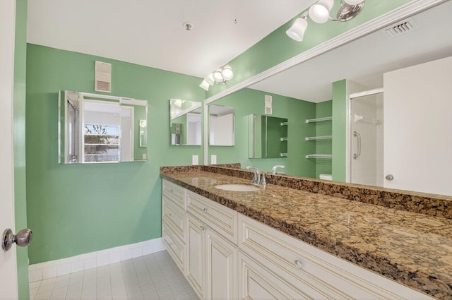 6112 Huntwick Ter Unit 106, Delray Beach, FL 33484 - full bath with a shower stall, vanity, and tile patterned floors
