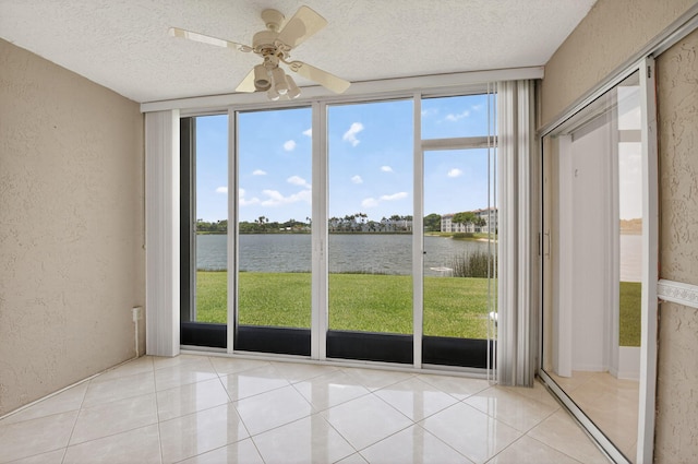6112 Huntwick Ter Unit 106, Delray Beach, FL 33484 - unfurnished sunroom with a water view