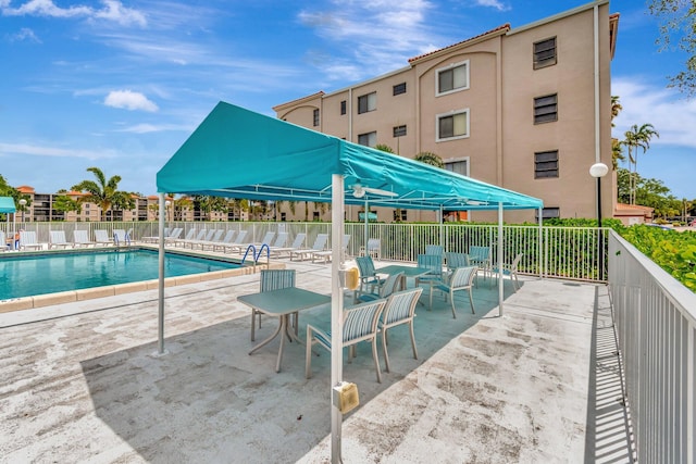 6112 Huntwick Ter Unit 106, Delray Beach, FL 33484 - community pool with a patio