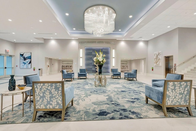 6112 Huntwick Ter Unit 106, Delray Beach, FL 33484 - building lobby featuring recessed lighting, stairs, and a high ceiling