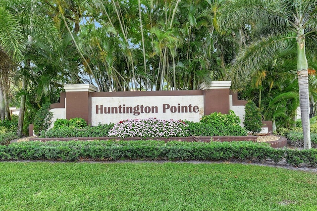 6112 Huntwick Ter Unit 106, Delray Beach, FL 33484 - community / neighborhood sign featuring a yard