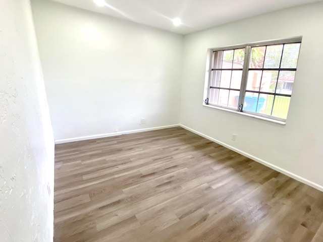1430 SW 25th Way Unit B, Boynton Beach, FL 33426 - empty room with wood finished floors