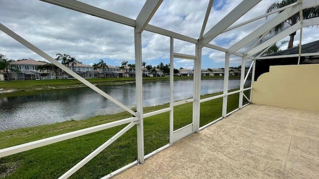 2039 Tarpon Lake Way, West Palm Beach, FL 33411 - unfurnished sunroom with a water view and a residential view