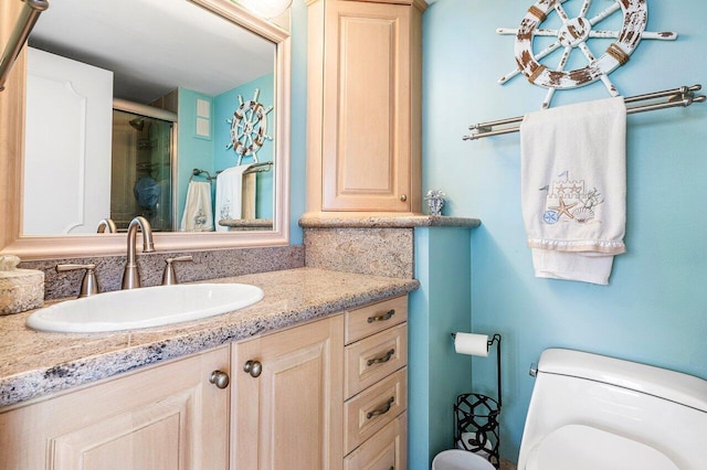 4505 S Ocean Blvd Unit 907, Highland Beach, FL 33487 - full bath with toilet, vanity, and a shower with shower door