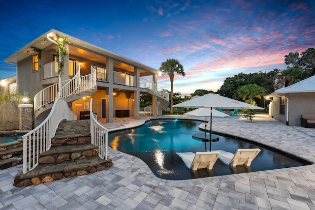 2130 W Boothe Dr, Fort Pierce, FL 34982 - swimming pool with stairway and a patio