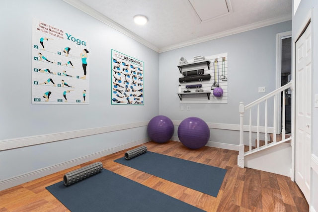 2130 W Boothe Dr, Fort Pierce, FL 34982 - workout area featuring crown molding and wood finished floors