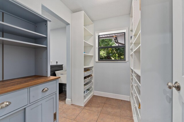 2130 W Boothe Dr, Fort Pierce, FL 34982 - walk in closet with light tile patterned floors