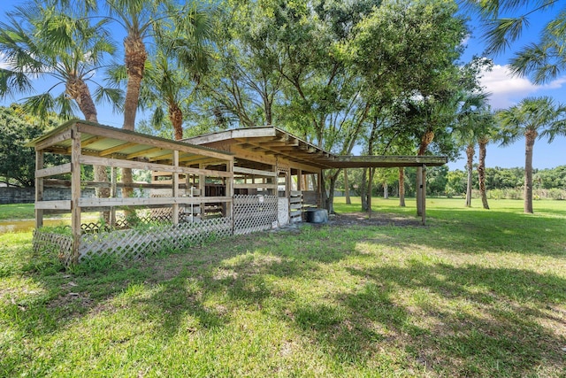 2130 W Boothe Dr, Fort Pierce, FL 34982 - view of grassy yard with an outdoor structure
