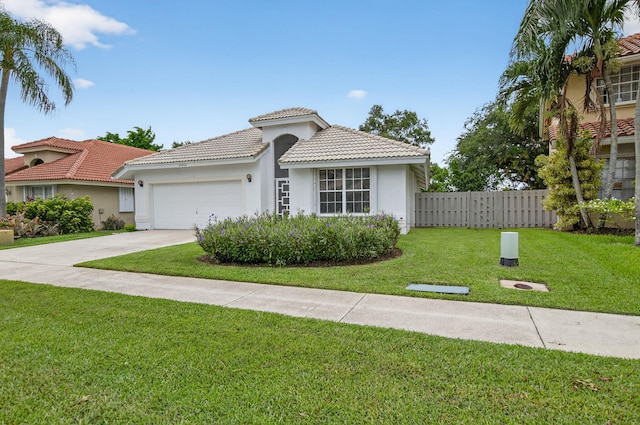 23440 Serene Meadow Dr S, Boca Raton, FL 33428 - mediterranean / spanish-style home featuring stucco siding, an attached garage, concrete driveway, and a tile roof