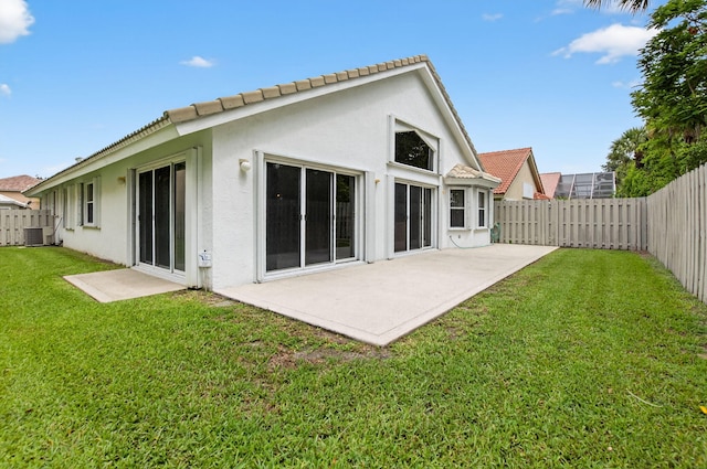 23440 Serene Meadow Dr S, Boca Raton, FL 33428 - back of house with stucco siding, a patio, a tiled roof, and central air condition unit