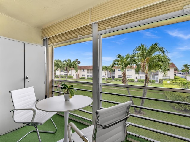9855 Sandalfoot Blvd Unit 320, Boca Raton, FL 33428 - sunroom / solarium with a residential view