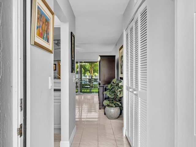 9855 Sandalfoot Blvd Unit 320, Boca Raton, FL 33428 - hall with light tile patterned floors