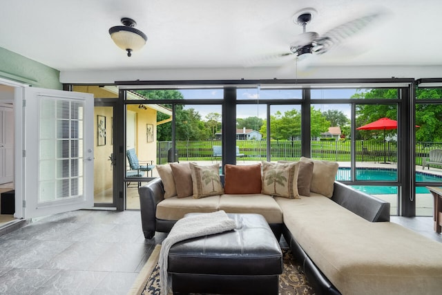 2413 NW 26th St, Boca Raton, FL 33431 - living room featuring a ceiling fan and plenty of natural light